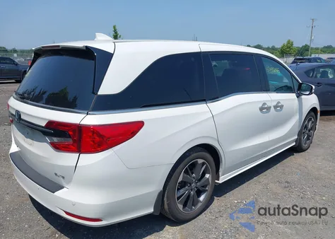 2023 Honda Odyssey Elite z USA, uszkodzony, nr VIN 5FNRL6H90PB021561